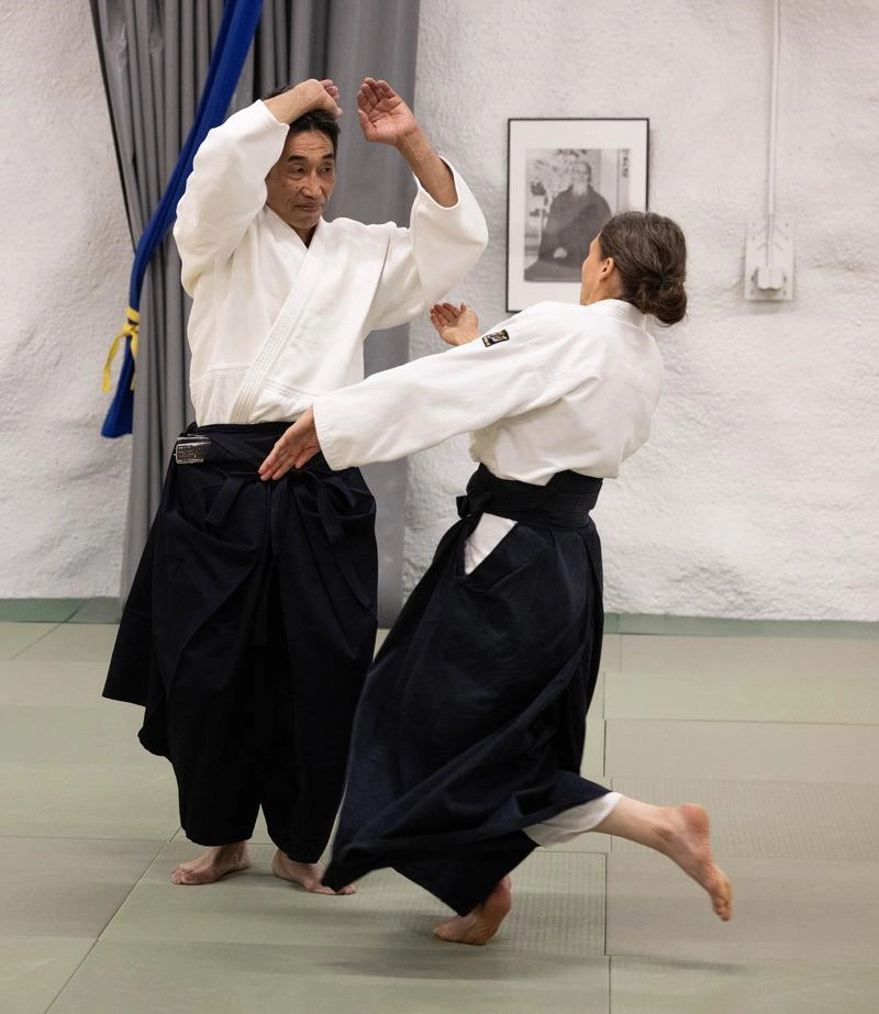 Sarita and Ariga practicing shomenuchi shihonage